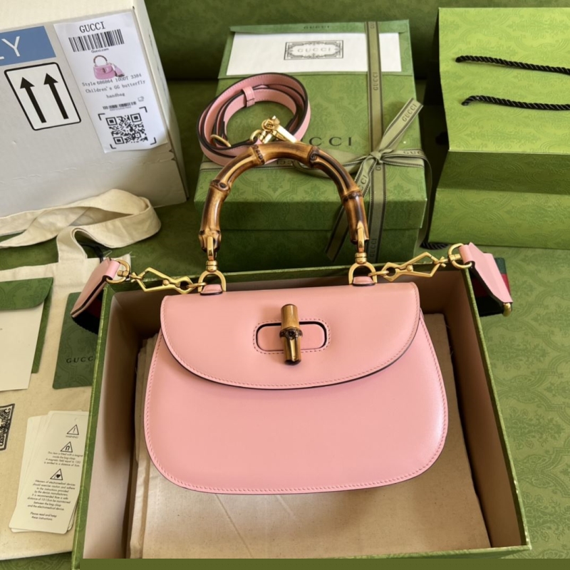 G*u*i top handle bags